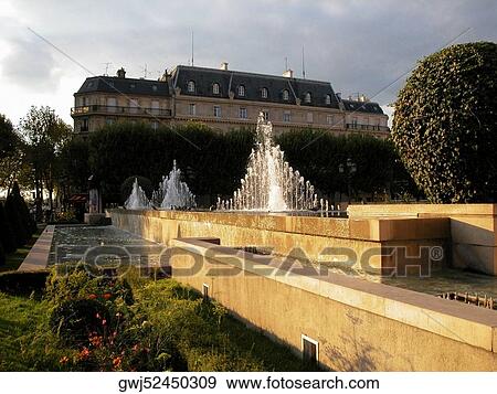 Fountain in front of a building, Paris, France View Large Photo Image Stock Photo - Fountain in front of a building, Paris, France. Fotosearch