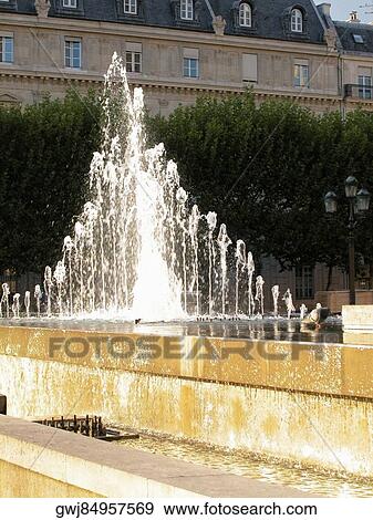 Fountain in front of a building, Paris, France View Large Photo Image Stock Photo - Fountain in front of a building, Paris, France. Fotosearch
