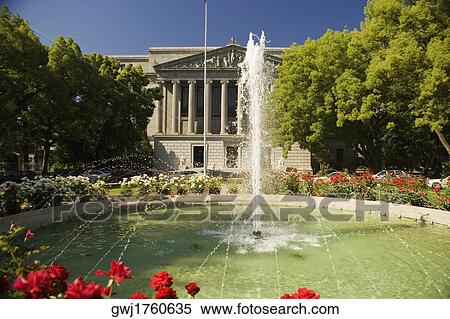 Stock Photography - Fountain in front of a government building. Fotosearch