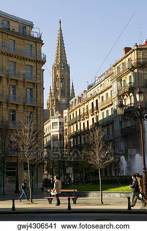 Four people walking on the street, Spain View Large Photo Image Stock Image - Four people walking on the street, Spain. Fotosearch