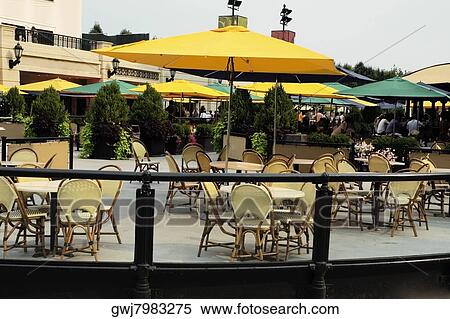 Furniture at an outdoor cafe, McCormick Tribune Plaza, Millennium Park, Chicago, Illinois, USA View Large Photo Image Stock Photography - Furniture at an outdoor cafe, McCormick Tribune Plaza, Millennium Park, Chicago, Illinois, USA. Fotosearch