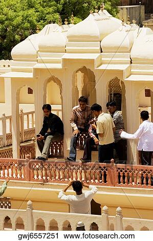 Group of people at a temple, City Palace, Jaipur, Rajasthan, India View Large Photo Image Stock Image - Group of people at a temple, City Palace, Jaipur, Rajasthan, India. Fotosearch