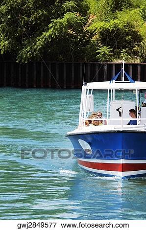 Group of people in a water taxi, Chicago River, Chicago, Illinois, USA View Large Photo Image Stock Photo - Group of people in a water taxi, Chicago River, Chicago, Illinois, USA. Fotosearch