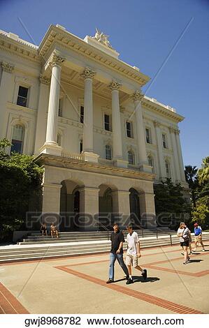 Group of people walking in front of a building, California, USA View Large Photo Image Stock Image - Group of people walking in front of a building, California, USA. Fotosearch