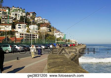 Group of people walking on a pier, Spain View Large Photo Image Stock Photography - Group of people walking on a pier, Spain. Fotosearch