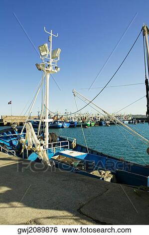 Group of trawlers docked at a harbor, Spain View Large Photo Image Stock Photograph - Group of trawlers docked at a harbor, Spain. Fotosearch