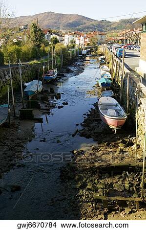 High angle view of a canoe docked at a canal, Spain View Large Photo Image Picture - High angle view of a canoe docked at a canal, Spain. Fotosearch