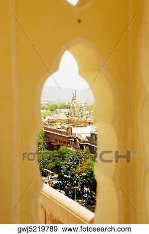 High angle view of a city seen through a window, City Palace, Jaipur, Rajasthan, India View Large Photo Image Stock Photo - High angle view of a city seen through a window, City Palace, Jaipur, Rajasthan, India. Fotosearch