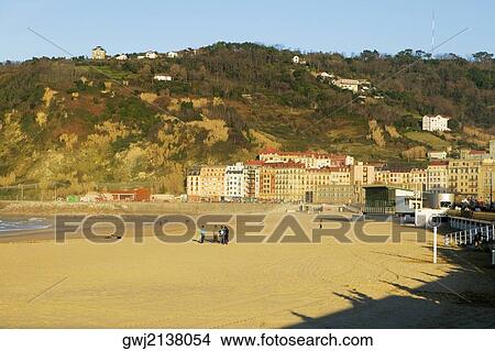 High angle view of a group of people standing on a beach, Spain View Large Photo Image Picture - High angle view of a group of people standing on a beach, Spain. Fotosearch