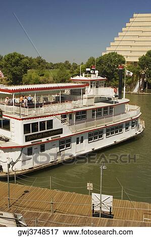 High angle view of a paddle steamer in a river View Large Photo Image Stock Photo - High angle view of a paddle steamer in a river. Fotosearch