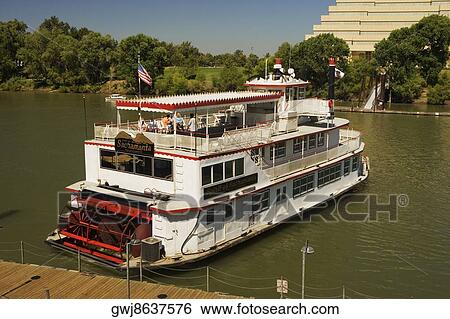High angle view of a paddle steamer in a river View Large Photo Image Stock Photograph - High angle view of a paddle steamer in a river. Fotosearch
