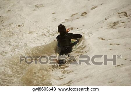 High angle view of a surfer in the sea View Large Photo Image Stock Image - High angle view of a surfer in the sea. Fotosearch