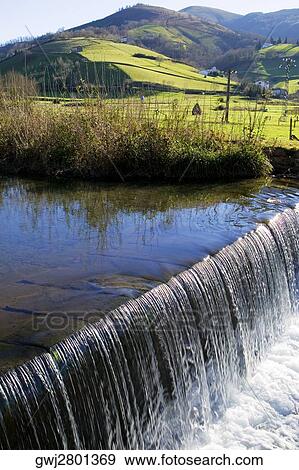 Stock Photo - High angle view of a waterfall, Spain. Fotosearch