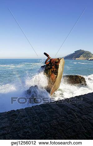 High angle view of waves crashing on the rock, Spain View Large Photo Image Stock Image - High angle view of waves crashing on the rock, Spain. Fotosearch