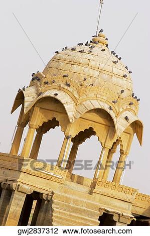 Stock Image - High section view of a dome, Gadi Sagar, Jaisalmer, Rajasthan, India. Fotosearch