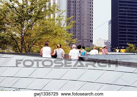 Large group of people walking on the bridge, BP bridge, Chicago, Illinois, USA View Large Photo Image Stock Photography - Large group of people walking on the bridge, BP bridge, Chicago, Illinois, USA. Fotosearch