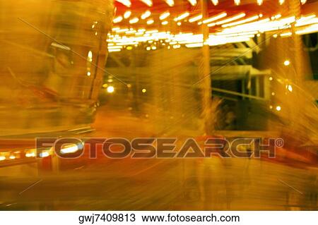 Lights on a carousel in an amusement park at night, San Diego, California, USA View Large Photo Image Stock Image - Lights on a carousel in an amusement park at night, San Diego, California, USA. Fotosearch