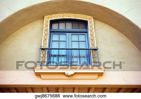 Stock Photograph - Low angle view of a balcony on a stucco building, San Diego, California, USA. Fotosearch