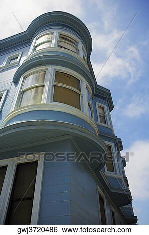 Low angle view of a building View Large Photo Image Stock Photograph - Low angle view of a building. Fotosearch