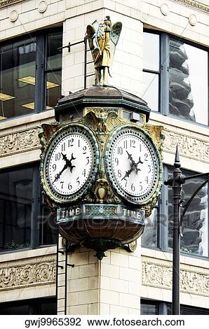 Low angle view of a clock on the side of a building, Chicago, Illinois, USA View Large Photo Image Stock Image - Low angle view of a clock on the side of a building, Chicago, Illinois, USA. Fotosearch