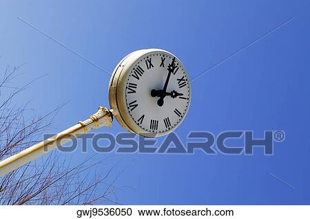 Low angle view of a clock, Spain View Large Photo Image Stock Image - Low angle view of a clock, Spain. Fotosearch