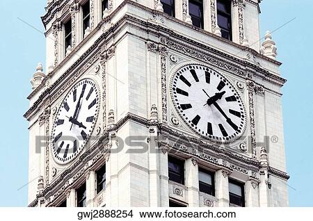 Low angle view of a clock tower, Wrigley Building, Chicago, Illinois, USA View Large Photo Image Picture - Low angle view of a clock tower, Wrigley Building, Chicago, Illinois, USA. Fotosearch