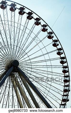 Low angle view of a ferris wheel View Large Photo Image Stock Image - Low angle view of a ferris wheel. Fotosearch