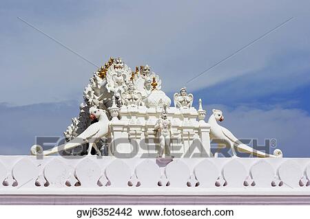 Low angle view of a figurine on top of a temple, Pushkar, Rajasthan, India View Large Photo Image Stock Image - Low angle view of a figurine on top of a temple, Pushkar, Rajasthan, India. Fotosearch