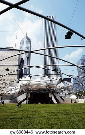Low angle view of a group of people standing on the lawn, Jay Pritzker Pavilion, Chicago, Illinois, USA View Large Photo Image Stock Photograph - Low angle view of a group of people standing on the lawn, Jay Pritzker Pavilion, Chicago, Illinois, USA. Fotosearch