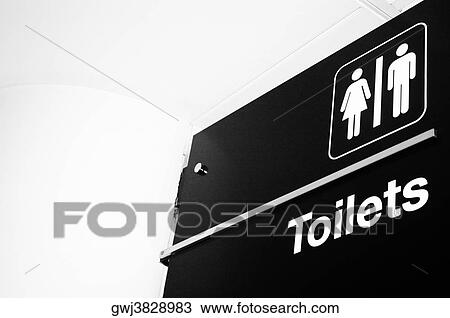 Low angle view of a restroom sign View Large Photo Image Stock Image - Low angle view of a restroom sign. Fotosearch