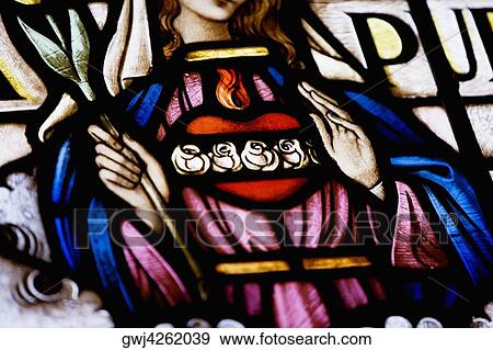 Low angle view of a stained glass window View Large Photo Image Stock Photo - Low angle view of a stained glass window. Fotosearch