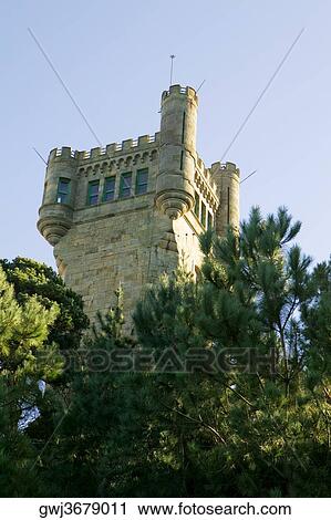Low angle view of a tower of a castle, Spain View Large Photo Image Stock Image - Low angle view of a tower of a castle, Spain. Fotosearch