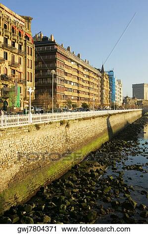 Low angle view of buildings on a waterfront, Spain View Large Photo Image Stock Image - Low angle view of buildings on a waterfront, Spain. Fotosearch