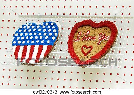 Low angle view of heart shaped cookie cakes View Large Photo Image Stock Image - Low angle view of heart shaped cookie cakes. Fotosearch