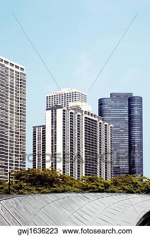 Stock Image - Low angle view of skyscrapers in a city, Chicago, Illinois, USA. Fotosearch