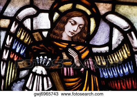 Low angle view of stained glass window View Large Photo Image Stock Image - Low angle view of stained glass window. Fotosearch