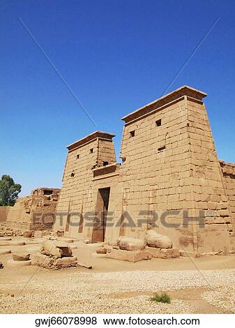Low angle view of the entrance of a temple, Temples Of Karnak, Luxor, Egypt View Large Photo Image Stock Photo - Low angle view of the entrance of a temple, Temples Of Karnak, Luxor, Egypt. Fotosearch