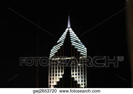 Low angle view of the top of a building lit up at night, Prudential Tower, Chicago, Illinois, USA View Large Photo Image Stock Image - Low angle view of the top of a building lit up at night, Prudential Tower, Chicago, Illinois, USA. Fotosearch