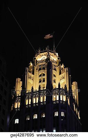 Low angle view of tower at night, Tribune Tower, Chicago, Illinois, USA View Large Photo Image Stock Photography - Low angle view of tower at night, Tribune Tower, Chicago, Illinois, USA. Fotosearch