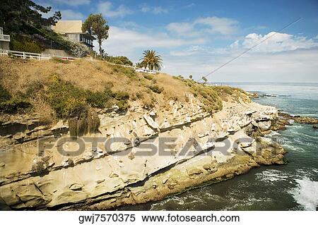 Panoramic view of a cliff at the La Jolla Reefs, La Jolla, San Diego, California, USA View Large Photo Image Stock Photography - Panoramic view of a cliff at the La Jolla Reefs, La Jolla, San Diego, California, USA. Fotosearch