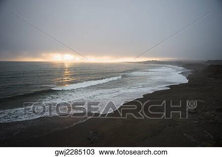 Panoramic view of the beach at dusk, Pacific Ocean View Large Photo Image Stock Image - Panoramic view of the beach at dusk, Pacific Ocean. Fotosearch