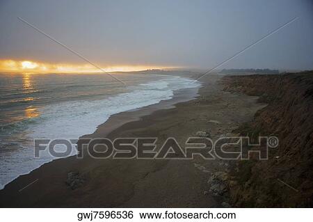 Panoramic view of the beach at dusk, Pacific Ocean View Large Photo Image Stock Photograph - Panoramic view of the beach at dusk, Pacific Ocean. Fotosearch