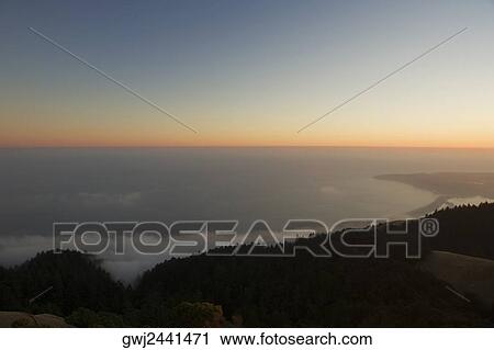 Panoramic view of the sea at dusk View Large Photo Image Stock Image - Panoramic view of the sea at dusk. Fotosearch