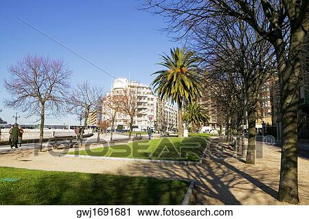 People walking on a waterfront, Spain View Large Photo Image Stock Image - People walking on a waterfront, Spain. Fotosearch