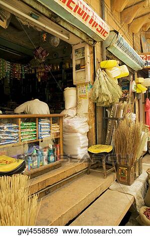 Person standing in a shop, Jaisalmer, Rajasthan, India View Large Photo Image Stock Photo - Person standing in a shop, Jaisalmer, Rajasthan, India. Fotosearch