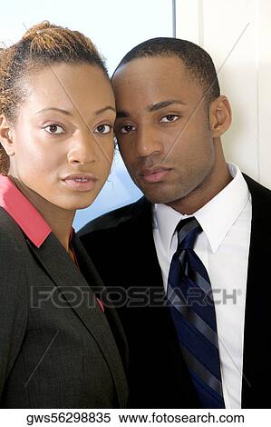 Portrait of a businessman and a businesswoman View Large Photo Image Stock Photography - Portrait of a businessman and a businesswoman. Fotosearch