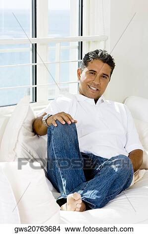 Portrait of a mid adult man smiling View Large Photo Image Picture - Portrait of a mid adult man smiling. Fotosearch