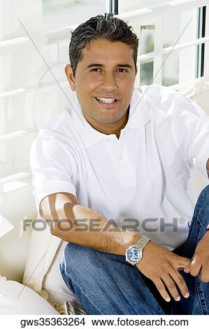 Picture - Portrait of a mid adult man smiling. Fotosearch