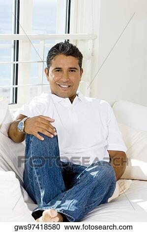 Portrait of a mid adult man smiling View Large Photo Image Stock Image - Portrait of a mid adult man smiling. Fotosearch