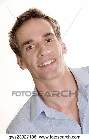 Portrait of a mid adult man smiling View Large Photo Image Stock Photograph - Portrait of a mid adult man smiling. Fotosearch